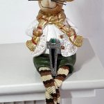 Art Deco-style genuine silver Brooch pin set with Black Onyx, Green Agate, and marcasite BRS00106. Front view on a toy mouse sitting.