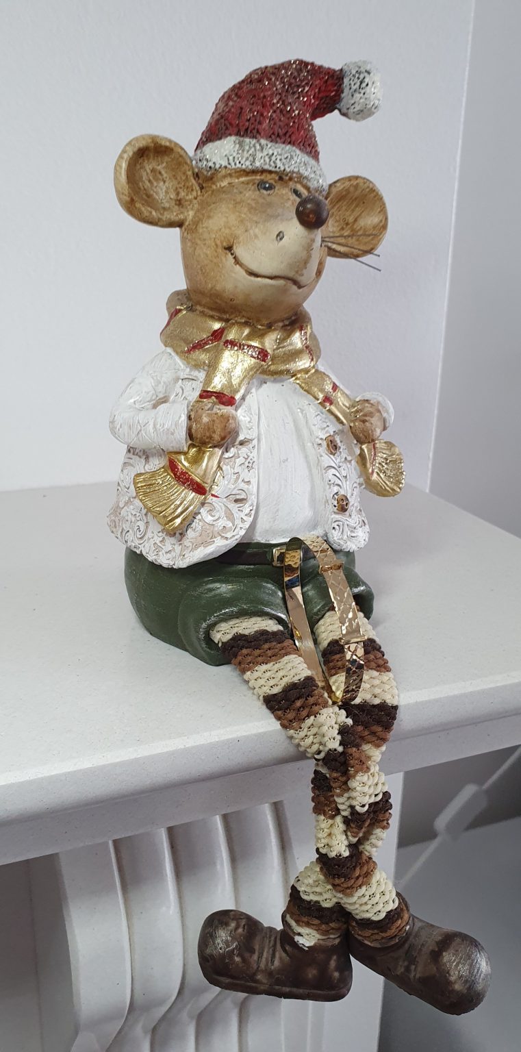 Gold expanding baby bangle 5mm wide with a diamond cut pattern BBG0003 shown in between the legs of a toy mouse that looks like an elf