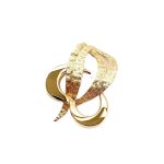 9ct yellow gold abstract leaf Brooch with a contrasting polished & tree bark texture front view.