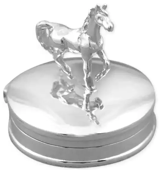 A petite round polished silver trinket box with a cantering horse on the top of the hinged lid.