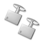 Genuine 925 sterling silver flat rectangular cufflinks with a petite star set diamond in one corner.