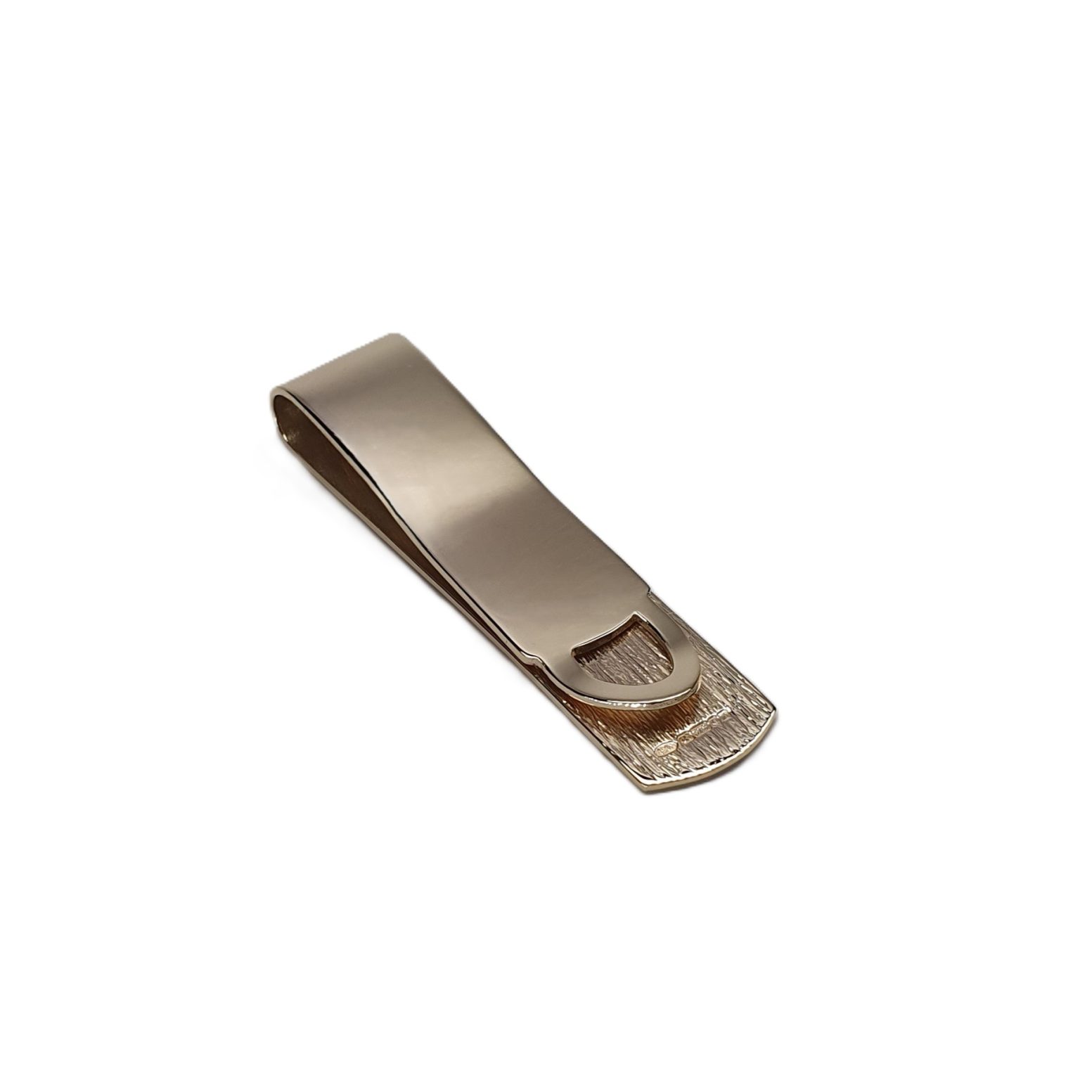 A handmade 9ct Gold Money Clip with a polished back and a hand-engraved tree bark pattern to the front. London hallmarked, it comes in a stylish black leatherette box with a black velvet pad and a white silk inner lid.