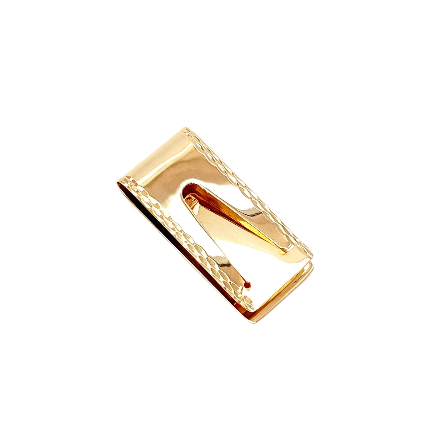 Antique-inspired gold clip showing the back pictured on a white surface.