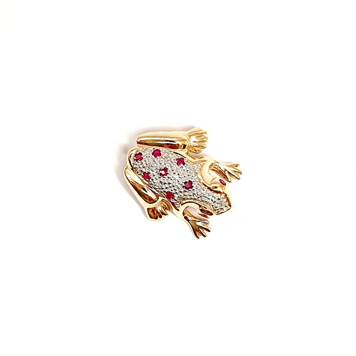 Yellow and white gold frog brooch with red rubies and white diamonds.