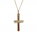 9ct gold cross pendant with hand-engraved tree bark texture.