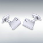 Hoxton rectangular curved genuine silver links on a white background with a diamond.