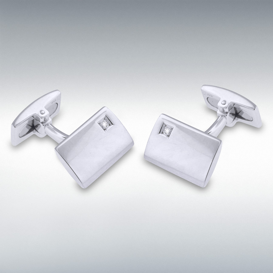 Hoxton rectangular curved genuine silver links on a white background with a diamond.