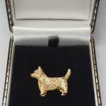 Picture of a 9ct Gold West Highland Terrier Brooch BR00058 in the gift box.