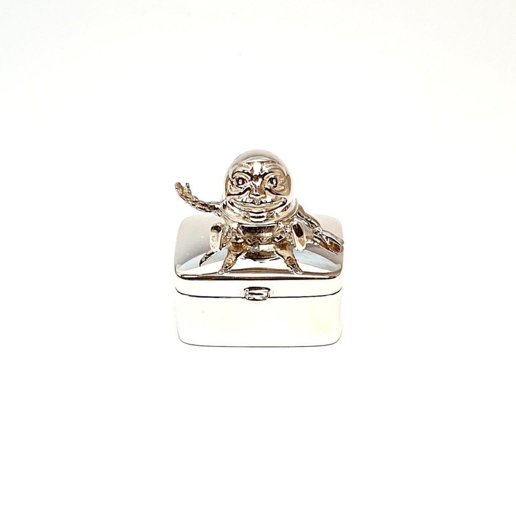Real silver Humpty Dumpty pill box pictured closed.
