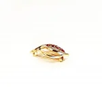 Yellow and white gold brooch with diamonds and rubies side view.