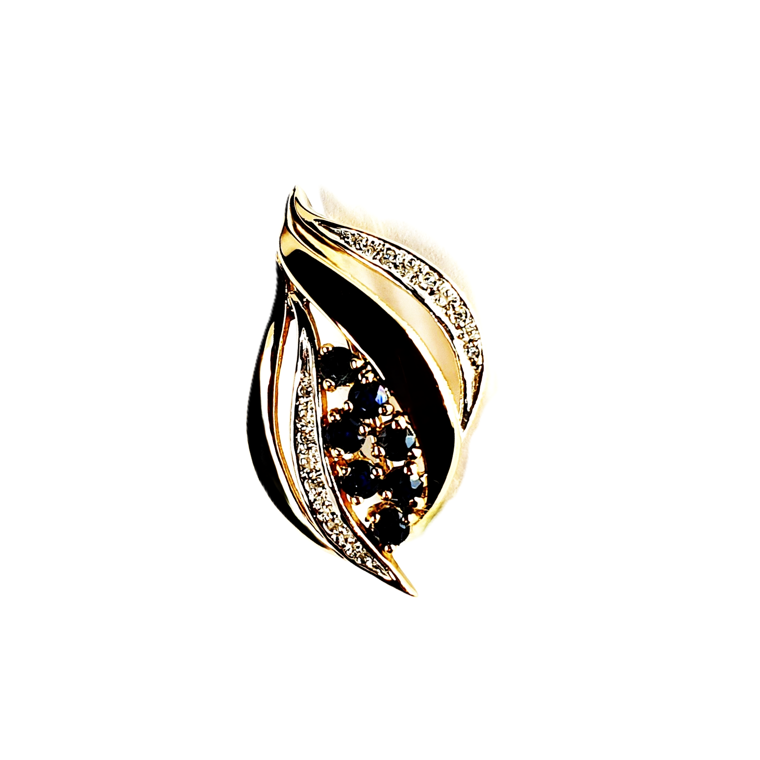 Close-up of a 9ct gold brooch with sapphires and diamonds in a classic retro style.