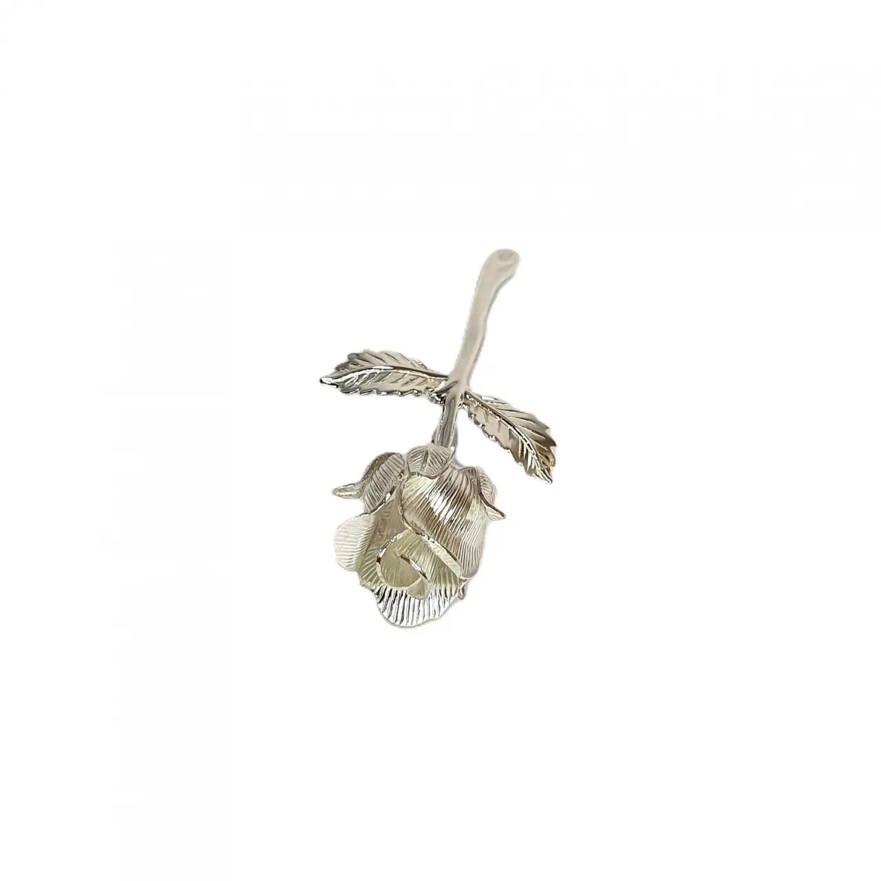 Brooch laying down to show the top of the rose bud