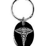 Close up picture of Oval medical alert key ring fob in real silver.