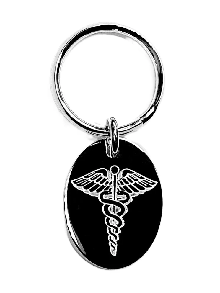 Close up picture of Oval medical alert key ring fob in real silver.