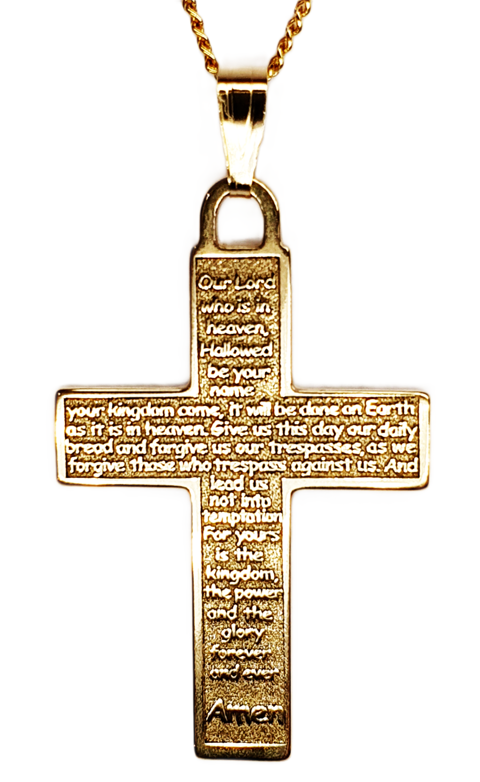 Real gold cross with the Lord's Prayer written on the front. Close up picture.