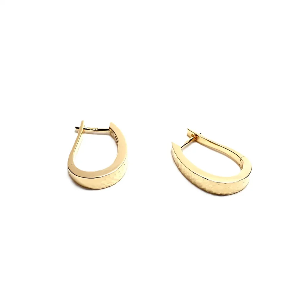 Side view of hinged Huggie hoop earrings.