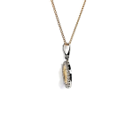 Two-tone 9ct gold Madonna pendant and chain surrounded with cubic zirconia, edge view.