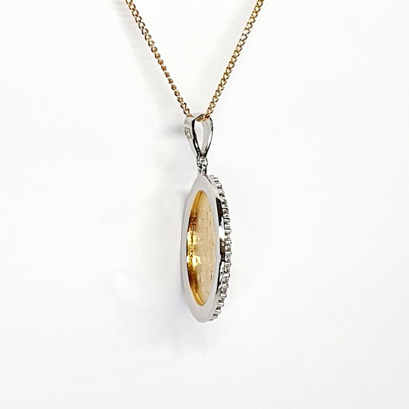 Picture showing the edge and back of Miraculous pendant PC00558 size 3.