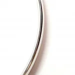 Closer up of a section of the white gold court shape bangle.