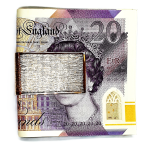 9-carat gold money clip with a barked pattern pictured with a £20.00 note.