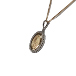 A two-tone, 9-carat gold Madonna pendant and chain surrounded by cubic zirconia. The front view leans right to show at an angle.