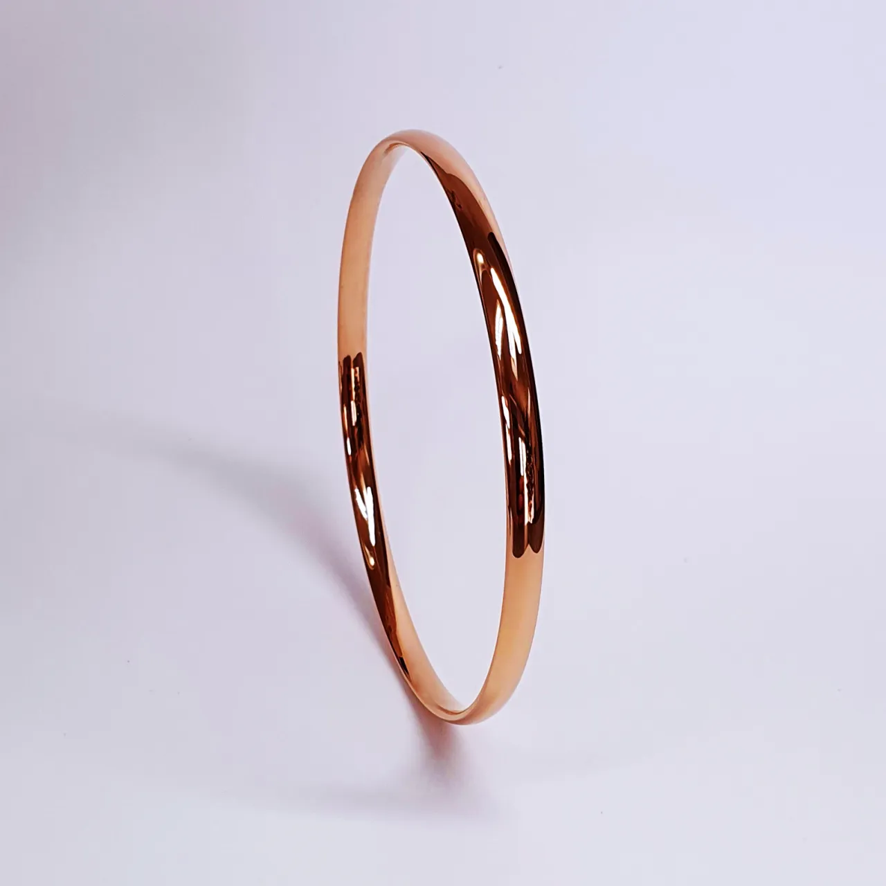 Solid court shape round rose gold bangle B00056.