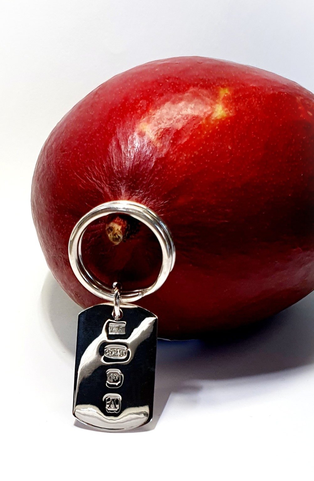 James bond style keyring fob with a feature hallmark.