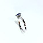 White gold, blue sapphire and diamond engagement ring