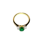 Elegant craftsmanship of a yellow and white gold ring shown from the side.