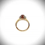 Elegant craftsmanship of a yellow and white gold ring shown from the side.