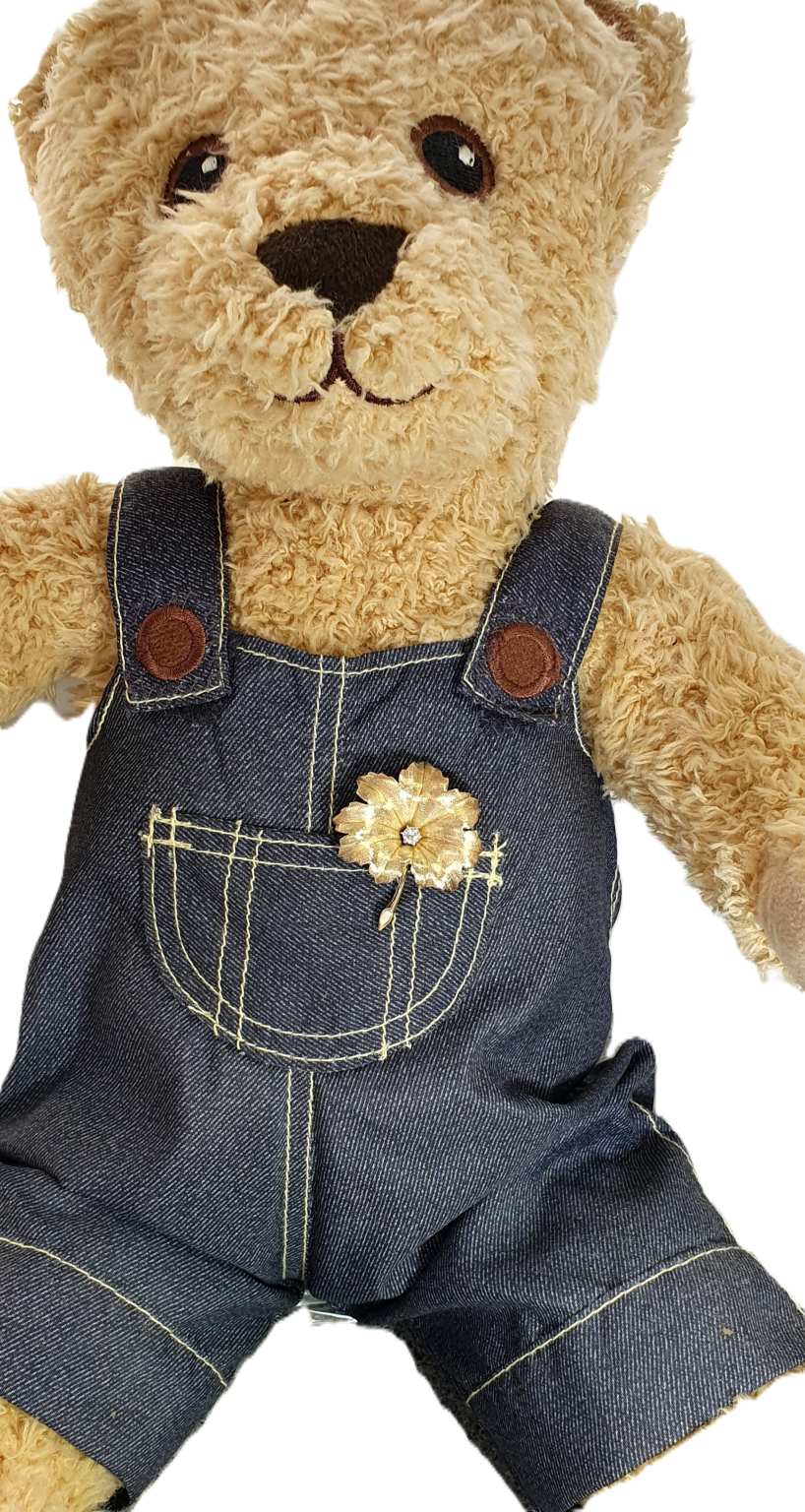Leaf brooch modelled by Mr. Teddy bear.