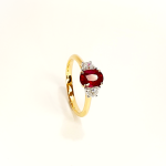 18ct yellow and white gold three stone ring with one oval ruby and two half moon diamonds, one on each side RA00698.