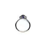 White gold, blue sapphire and diamond engagement ring