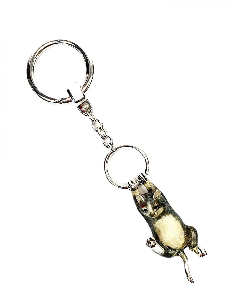 Hallmarked 925 silver cat key fob or handbag charm with grey and brown enamel swinging from a ring.