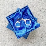 Hallmarked stirrup key fob with a highly polished finish. Pictured in the gift box.