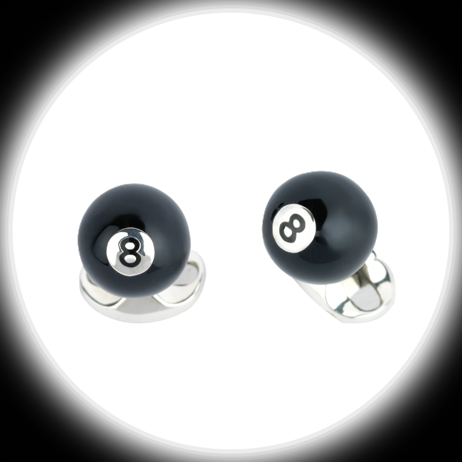 Handcrafted silver cufflinks with a smooth black enamel 8-ball design, a stylish accessory for pool players and collectors.