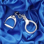 Hallmarked stirrup key fob with a highly polished finish. Pictured in the gift box.