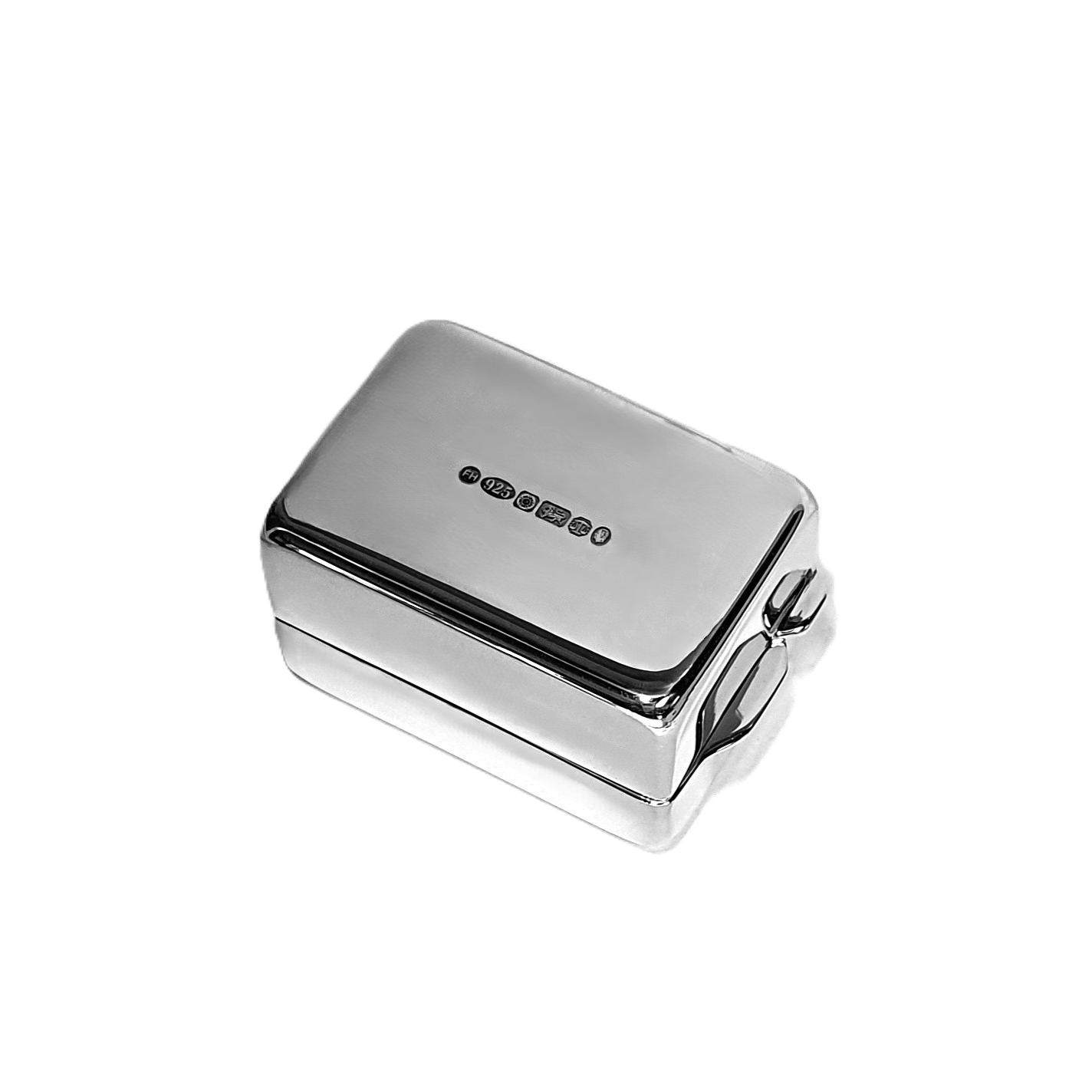Close-up of silver pill container base showing UK hallmark stamp, highlighting authenticity and craftsmanship in detailed focus.