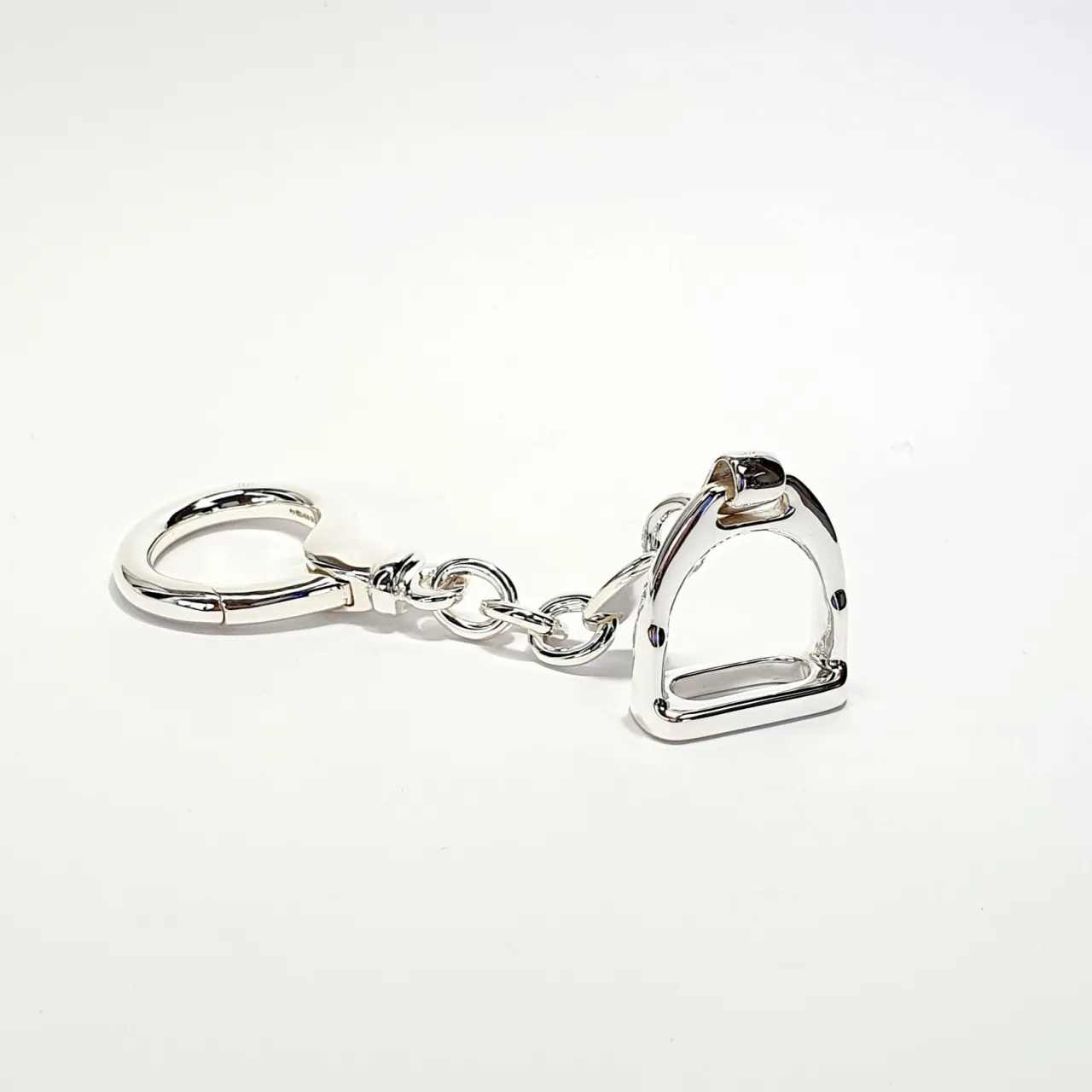 Genuine sterling silver horse stirrup keyring fob with a highly polished finish.