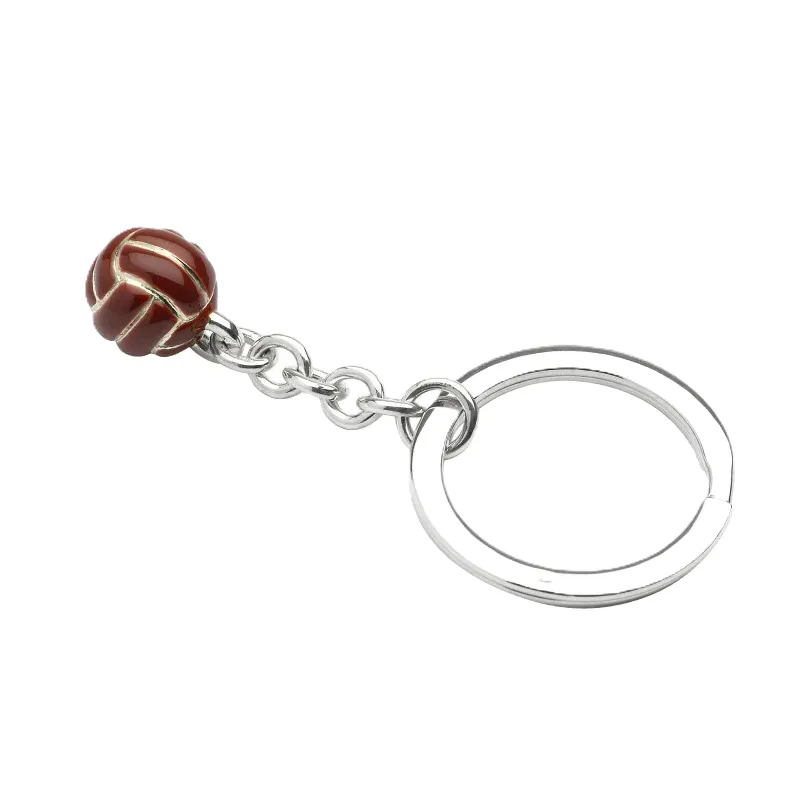 Classic Elegance: A beautifully crafted sterling silver football keyring with a hand-enamelled brown finish, celebrating the heritage of vintage leather footballs.