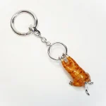 Hallmarked 925 silver 3D ginger cat key fob or handbag charm with ginger and white enamel swinging from a ring.Pictured from the back.