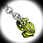 Close-up of The Frog End Sterling Silver Frog Keyring, featuring a bright green vitreous enamel finish on hallmarked sterling silver.