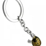 Hallmarked sterling silver tortoise keyring fob with brown enamel and real blue sapphire eyes KF00060.