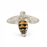 Yellow and black enamel honey bee brooch in sterling silver with polished wings, designed by Saturno.