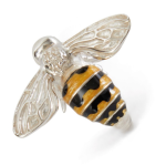 Artisan-crafted sterling silver honey bee brooch featuring yellow and black enamel on the body, smooth silver wings, and a presentation box with blue silk lining.