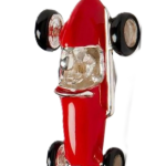 Close-up of 1950s-style red racing car cufflinks in sterling silver, featuring black enamel tyres and polished detailing.
