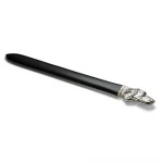 “British-made sterling silver dog-themed paper knife displayed flat on a white background, showcasing the hallmarked silver dog’s head and black acrylic blade.”