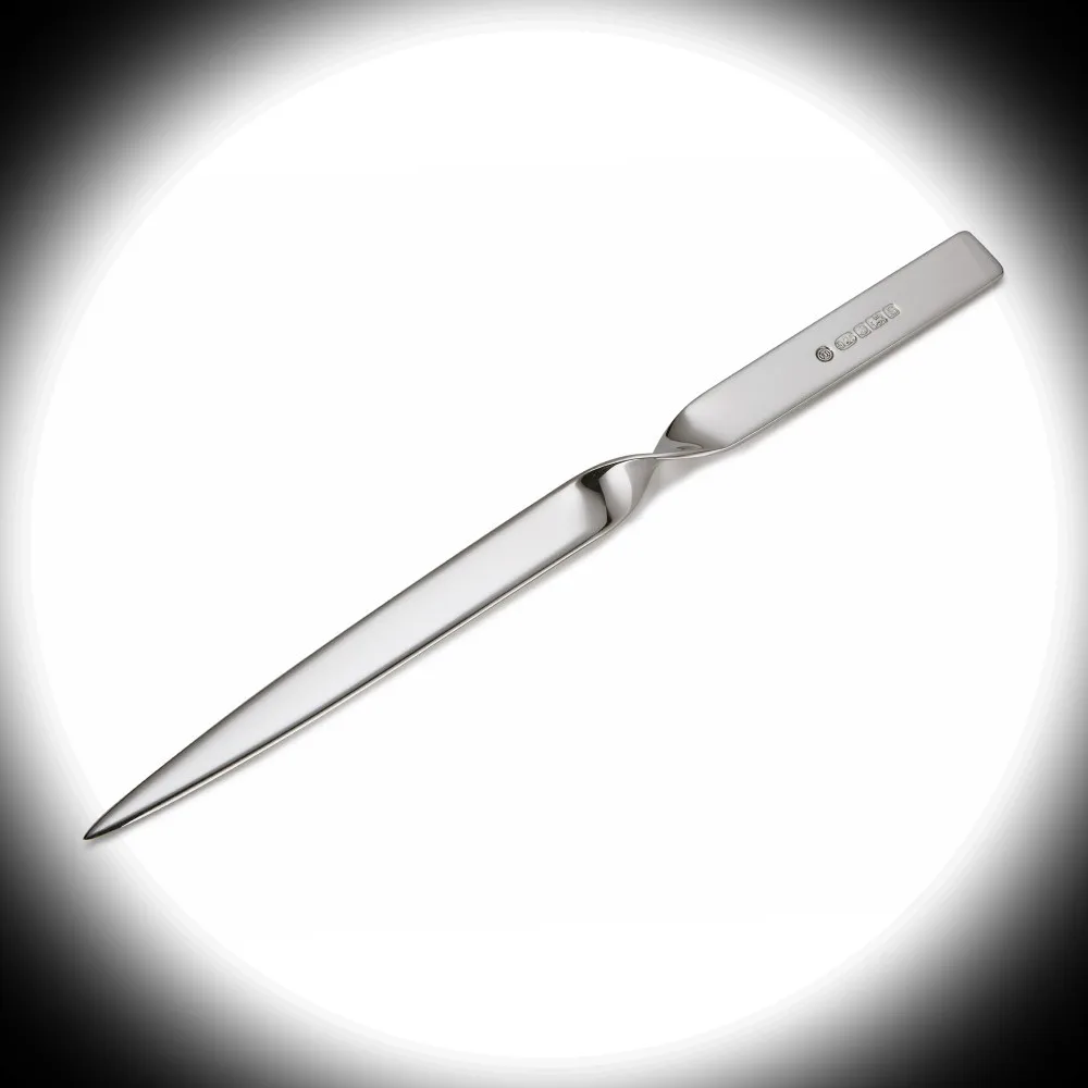 Sterling Silver Letter Opener illuminated by white spotlight against black backdrop, showing elegant twist and hallmark detail on the handle.