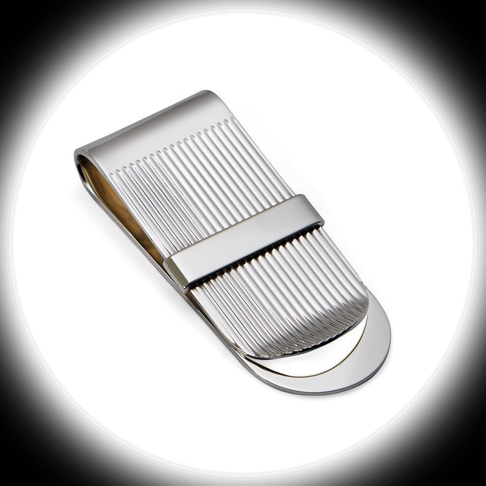 "Dramatic spotlight on the Stripe Money Clip with polished band across stripes, highlighting its engraving-ready surface and silver craftsmanship."