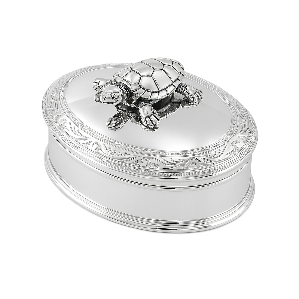 Polished oval silver box with hinged lid, scroll border, and movable turtle on top. Shown on a plain white background.